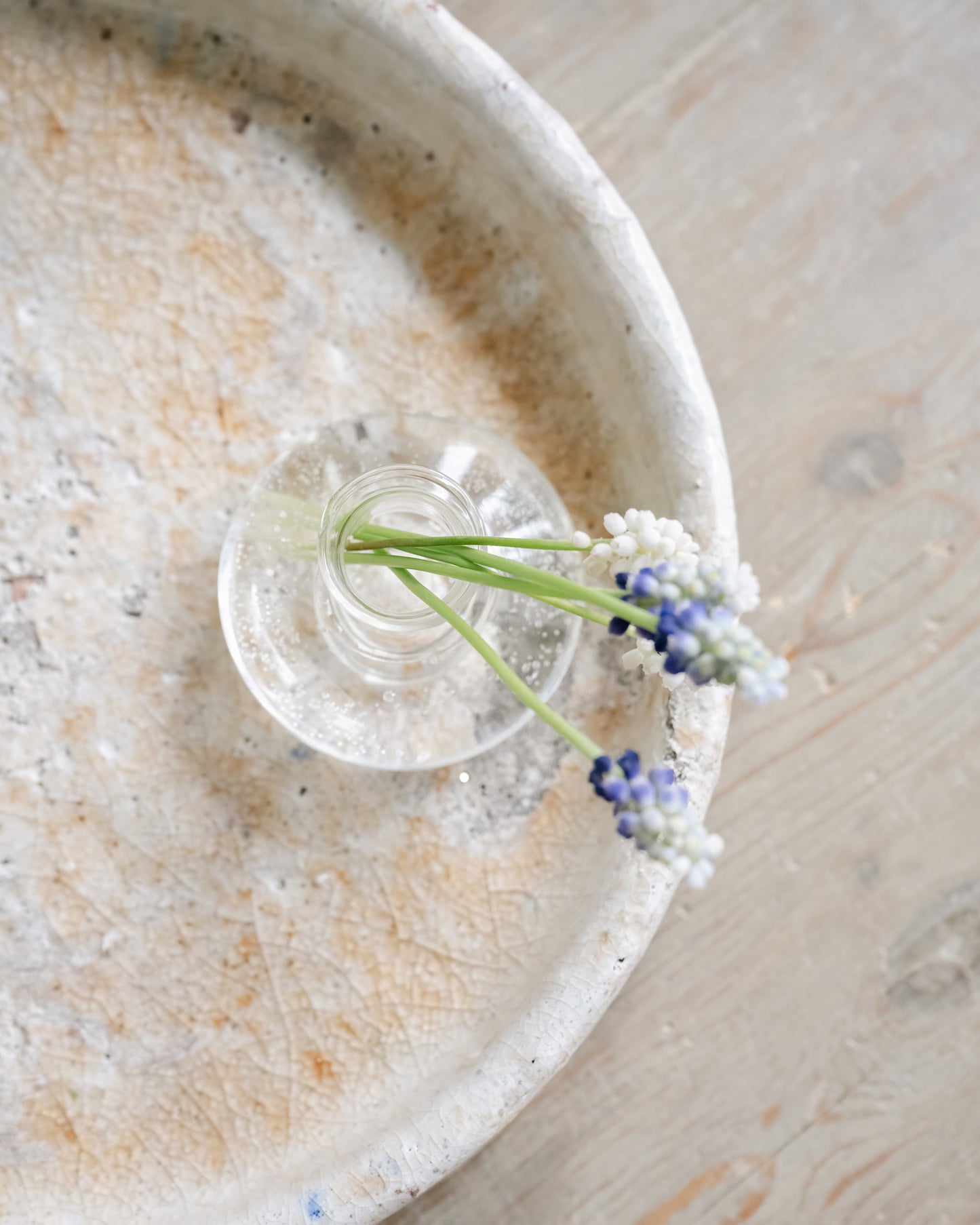 Blue inspiration flowers in glass vase